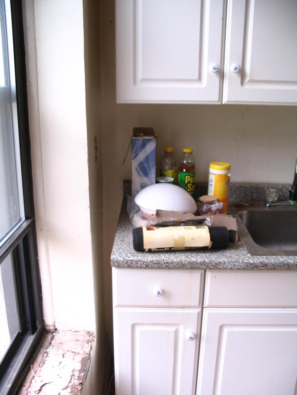 The Water Damaged Kitchen Window Sill